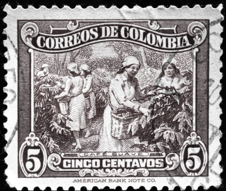 古いスタンプ。コーヒーを収穫するコロンビア女性の絵